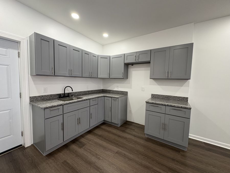 Gray shaker kitchen remodel with granite counters